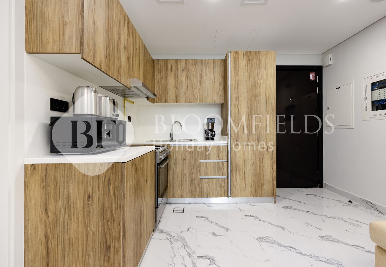 Apartment in Abu Dhabi - 719-Bloomfields Stylish 1BR Canal View