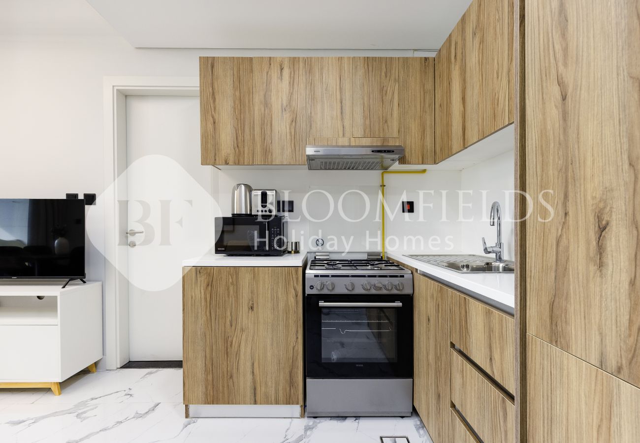 Apartment in Abu Dhabi - 719-Bloomfields Stylish 1BR Canal View